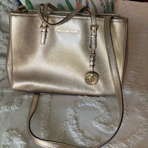 Michael Kors metallic gold purse